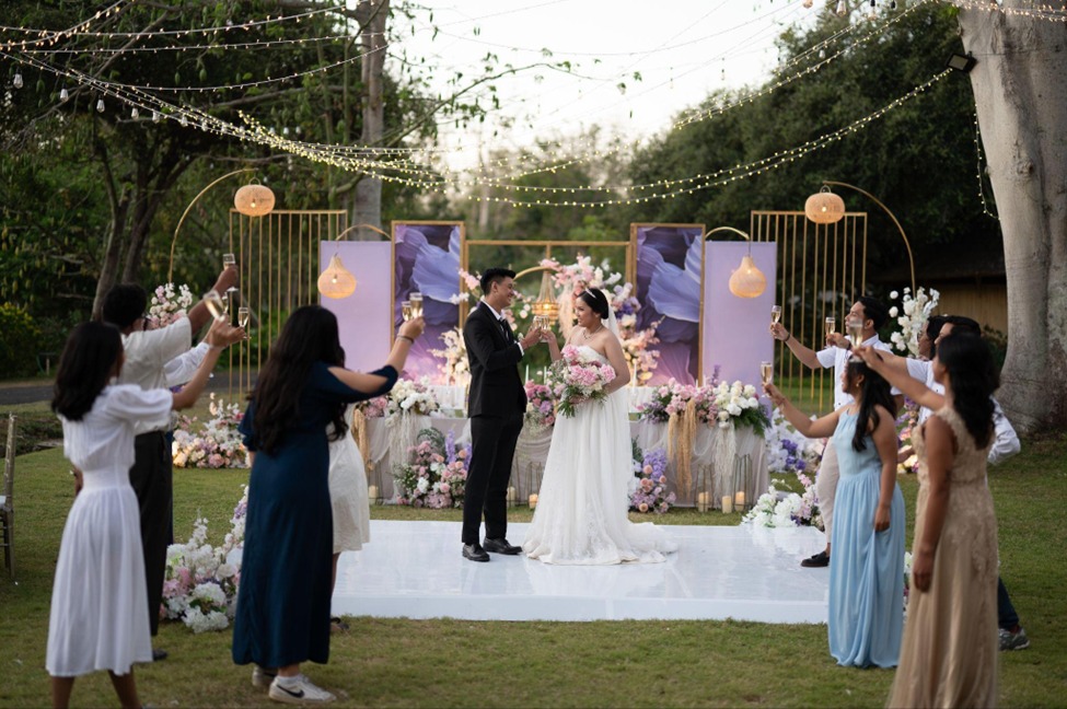 Rustic outdoor garden wedding ceremony setup in Jimbaran Bali